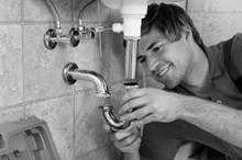 Image result for Plumber fixes the pipes and taps so that we can have water.
